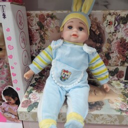 عروسک نوزاد سایز 16 موزیکال باطری خور با لباس و کلاه زیبا