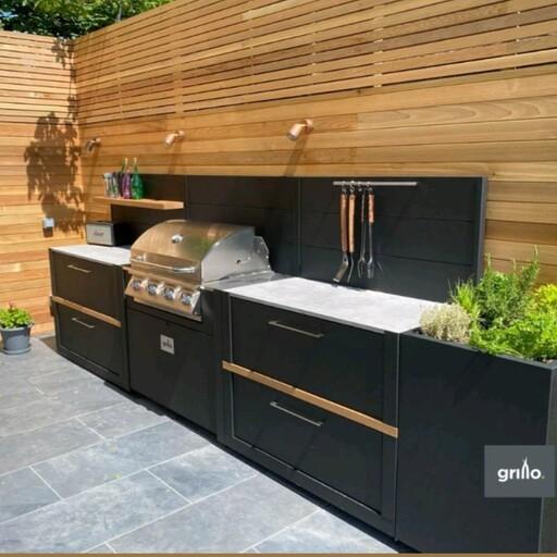 کابینت  outdoor ، با کباب پز و سینک  یک آشپزخانه کامل در حیاط ، با میزکار و کشو 