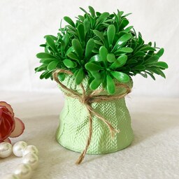 گلدان به همراه گل مصنوعی میخک مدل بافت رنگ سبزپسته ای ارتفاع 12 سانتی متر