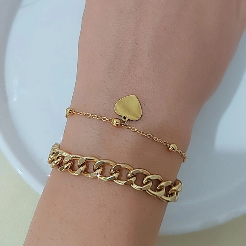 دستبند دولاین کارتیر و خلخال طلایی با آویز قلب جنس استیل رنگ ثابت