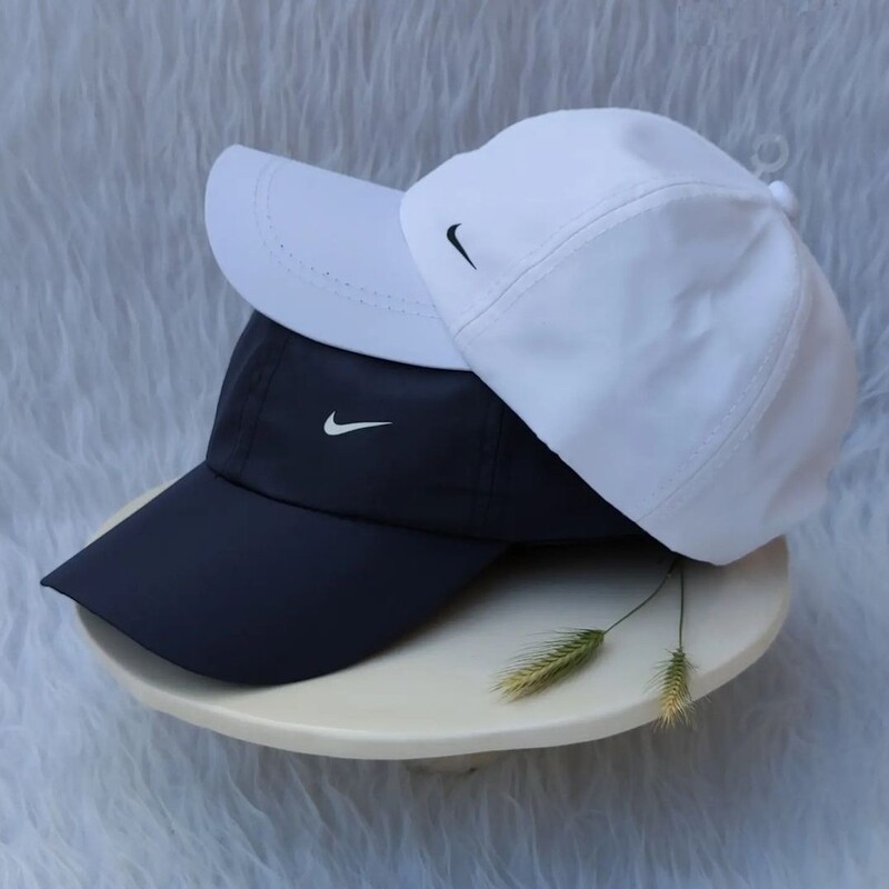 کلاه شمعی با کیفیت نایک در 2رنگ سفید و مشکی ، شیک و جذاب مناسب آقایان و خانوم های شیک پسند