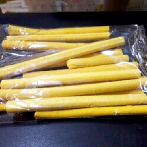 کشک رشته ای زرد دارای شیرین بیان تازه و نرم (100 گرم) 
