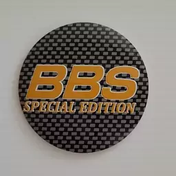 آرم وسط رینگ چرخ ماشین طرح BBS کربن نوشته زرد(مناسب همه رینگهای اسپرت با دهنه سایز 030)