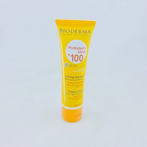 کرم ضد آفتاب رنگ طبیعی فتودرم مکس بیودرما spf100 ( دایره زرد )ضد آب بافت سبک پوشش دهی بالا ماندگاری بالا