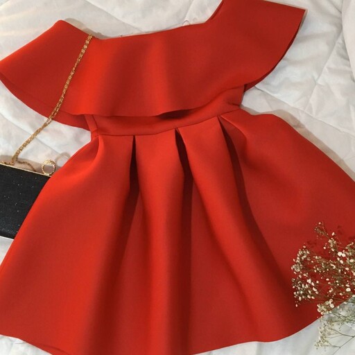 پیراهن مجلسی کوتاه دخترانه  ، مدل عروسکی رنگ قرمز ، مناسب سایز 34 و 36 با تن خور  شیک و عروسکی