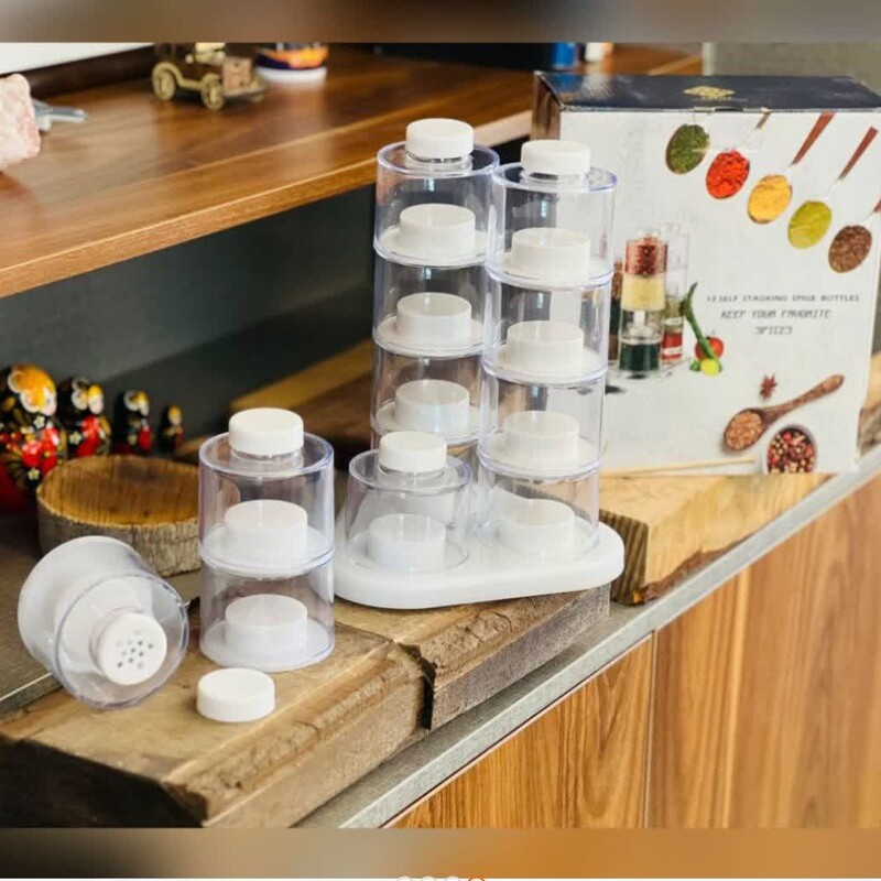 برج ادویه گردان  دوازده عدد جا ادویه نمک پاشی  همراه با استند گردان  گزینه مناسب برای آشپزخانه کوچیک 