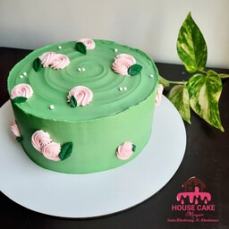 کیک تولد خامه ای  یک کیلوی سبز با گلهای صورتی