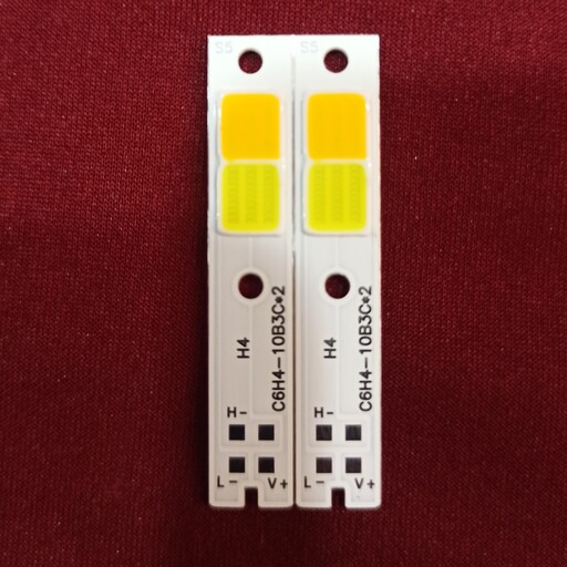 چیپ هدلایت مدل h4 دو رنگ سفید و زرد لیمویی دو کنتاکت  بسته دو عددی