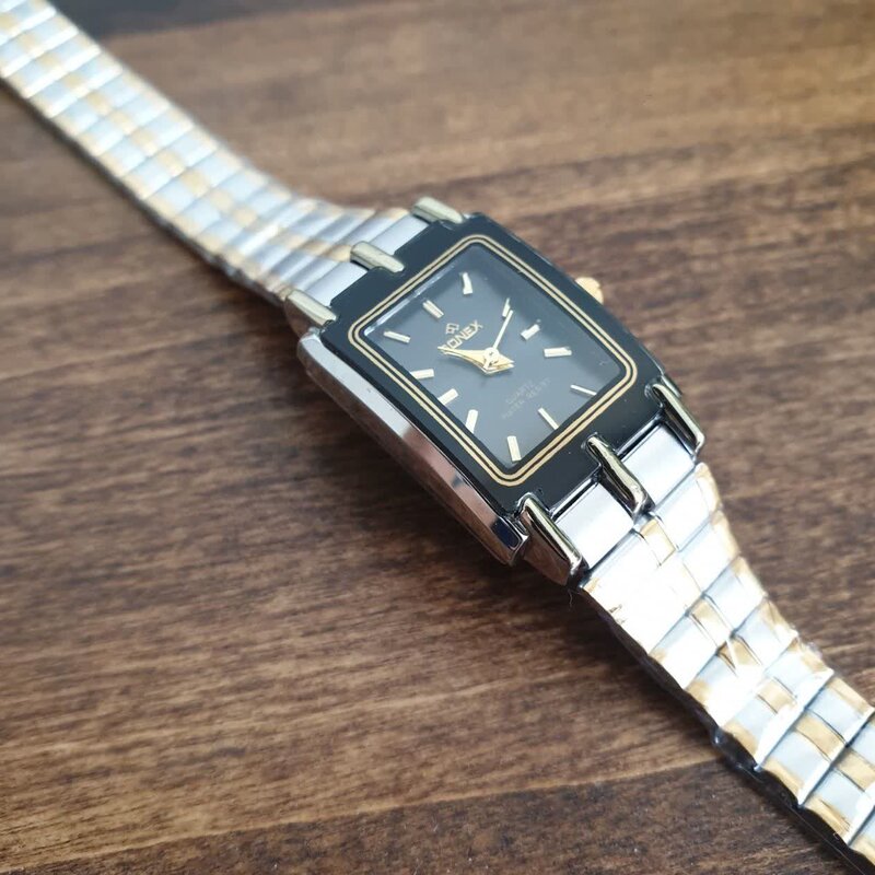 ساعت مردانه و زنانه ست سونکس صفحه مستطیل طراحی کلاسیک بند و بدنه فلزی استیل دو رنگ طلایی و نقره ای 
