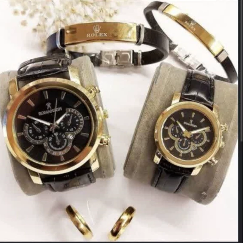 ساعت ست مردانه  زنانه رومانسون طرح سه موتوره همراه دستبند چرمی و حلقه انگشتر