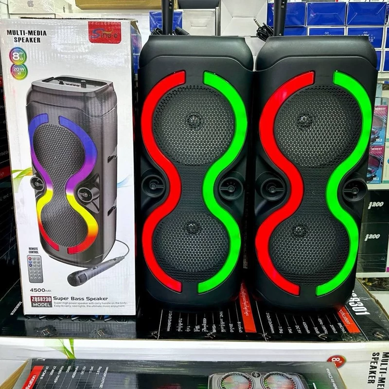 اسپیکر چمدانی مدل ZQS8230 رم و فلاش خور بلوتوث دار و رقص نور زیبا دارای میکروفون سیم دار