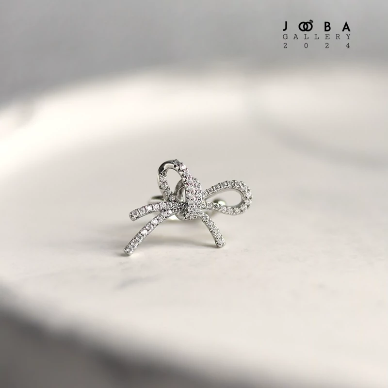 گوشواره فیک نقره ای برند ژوپینگ کد115081034