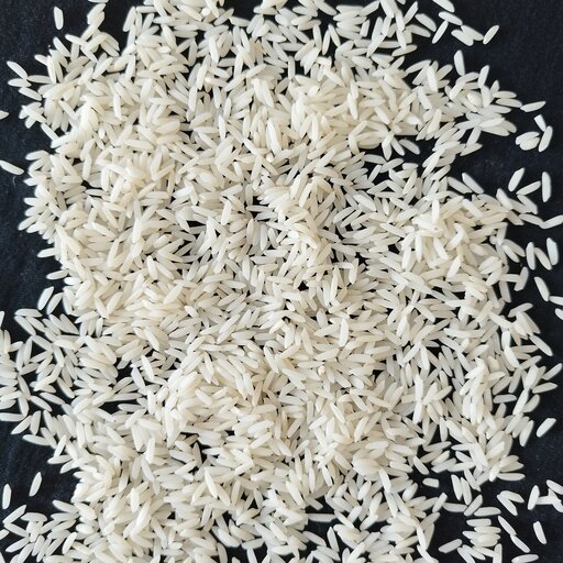 برنج طارم محلی دانه بلند فریدونکنار خوش عطر و خوشپخت و خوشمزه سورت شده توسط بروزترین ماشین آلات شالیکوبی 