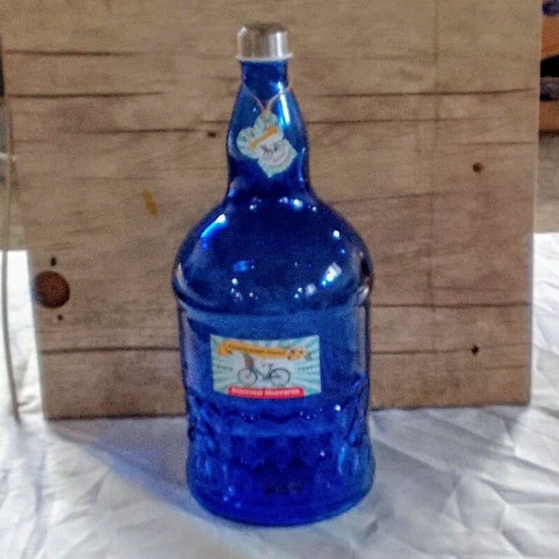 بطری آبی4لیتری دنا کبالتی خورشیدی دست ساز پرس بادی با درب چوب پنبه وارداتی محصولی باکیفیت و بسیار کاربردی 