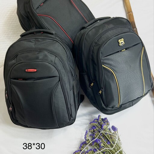 کیف کوله پشتی رنگ مشکی با نوار دوزی رنگی ابعاد 30 در 38 