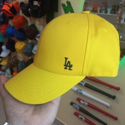 کلاه کتان ساده رنگ زرد.          