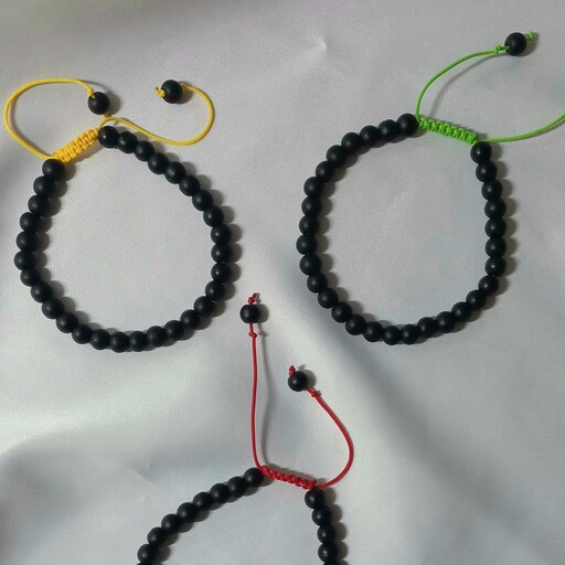 دستبند های مهره ای با گره کشویی ساخته شده با مهره های اونیکس 