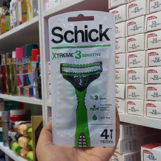 ژیلت Schick چهار عددی سه تیغ اصل آمریکا دارای نوار لغزنده حاوی ویتامین E و آلوئه ورا 