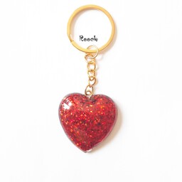 جاسوییچی قلب مناسب اویز کیف و کوله و کلید و آیینه ماشین.  قابل سفارش با رنگ قرمز و سبز و سرخابی و طلایی  و بنفش