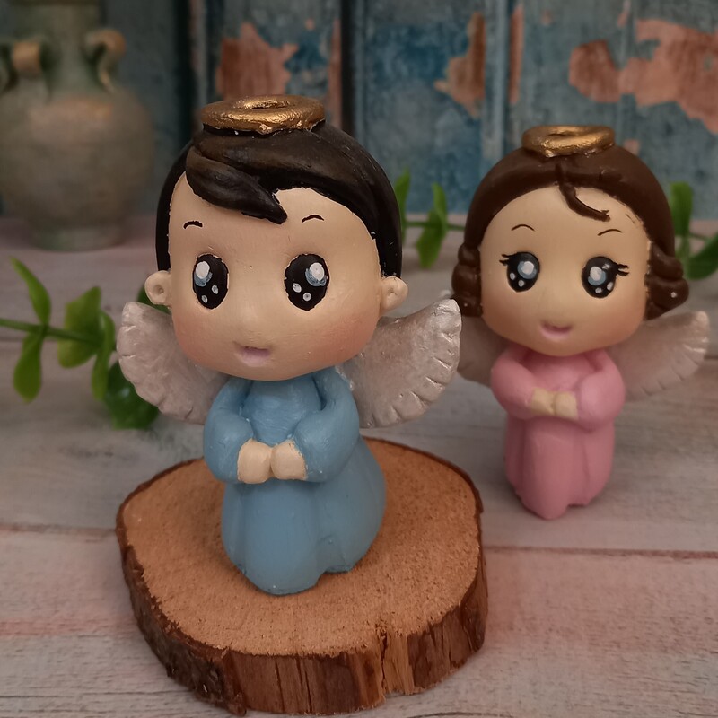 مجسمه فرشته دختر و پسر