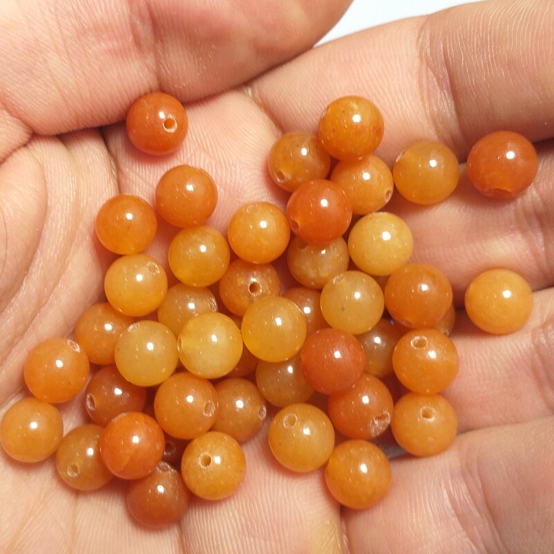 مهره سنگ آونتورین پرتقالی  اصل و معدنی بدون رنگ شدگی و احیا با بهترین کیفیت و قیمت برای 1 عدد مهره میباشد 