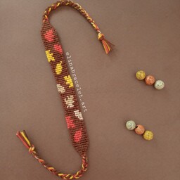 دستبند دوستی طرح برگ پاییزی بافت 