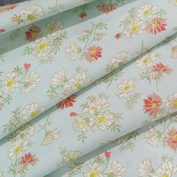 پارچه عریض پنبه طرح شکوفه به عرض یک و نیم متر با رنگ زمینه سبز کم رنگ