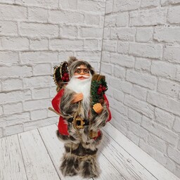 عروسک بابا نوئل کوله پشتی دار