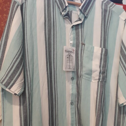 پیراهن مردانه جنس کنف لینن پارچه ترک رنگ بندی ترکیبی سایز بندی لارج تا 2ایکس یقه انگلیسی تک جیب خنک و راحت....
