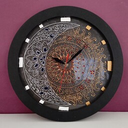 ساعت نقاشی شده با ویترای روی شیشه طرح ماه و خورشید قطر 30 و قاب مشکی سه سانتی 