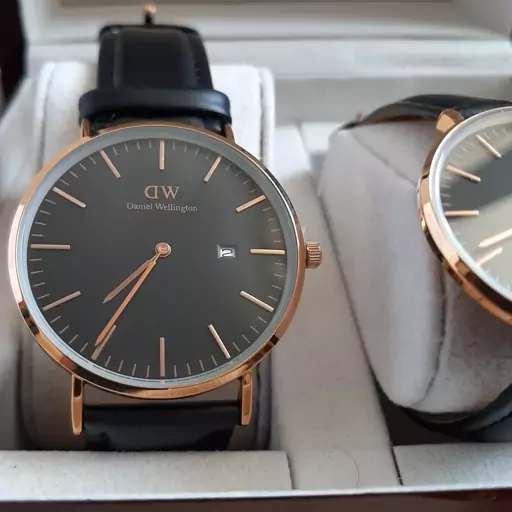 ساعت مچی مردانه دنیل ولینگتون Daniel Wellington دی دبلیو  چرمی مشکی  قاب رزگلد صفحه مشکی موتور ژاپن ساعت عبدی