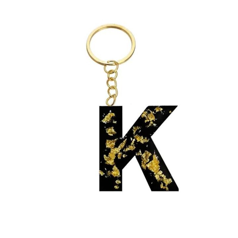 آویز جا کلیدی حروف انگلیسی حرفKجنس رزین کار شده با ورق طلا رنگ مشکی طلایی