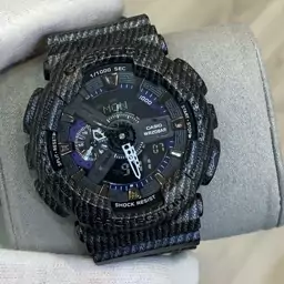 ساعت  مچی جی شاک GA110 مشکی خط دار(جیشاک GShock) ، صد در صد ضدآب ، تنظیم اتوماتیک با پایتخت کشورها ، اتولایت دار