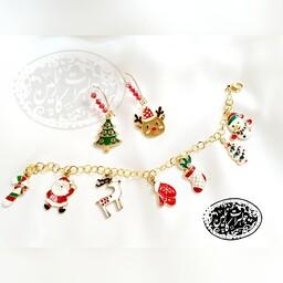 نیم ست گوشواره و دستبند طرح کریسمس با زنجیر استیل طلایی رنگ ثابت