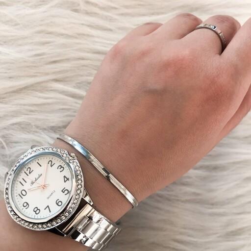 ساعت زنانه بالدا فلزی نقره ای.به همراه دست بند ماری رنگ ثابت.
