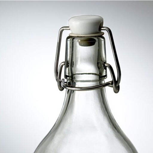 بطری شیشه ای آیکیا مدل کورکن korken. شیشه ی بیرنگ شفاف. نیم لیتری. کدمحصول 203.224.72
