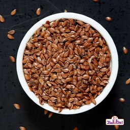 تخم کتان قرمز اعلا 250 گرمی اعتماد تمیز و سورت لیزری