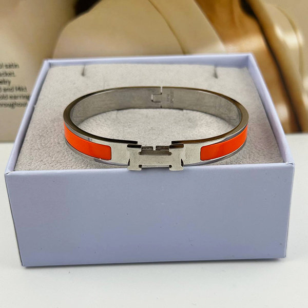 دستبند استیل هرمس قرمز با H نقره‌ای