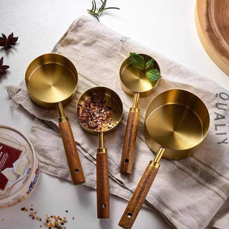پیمانه دسته چوبی استیل طلایی 5سایز (پست پیشتاز پس کرایه)