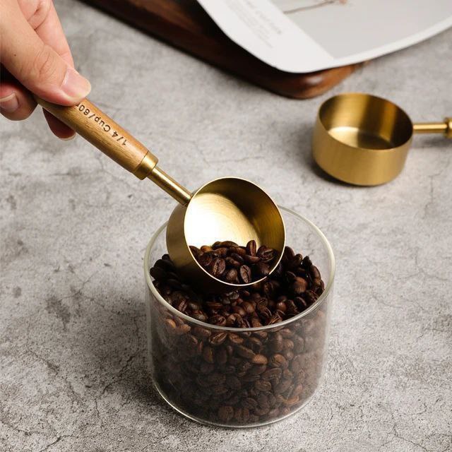 پیمانه دسته چوبی استیل طلایی 5سایز (پست پیشتاز پس کرایه)