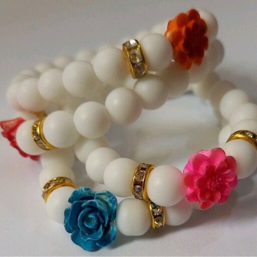 دستبند انیکس سفید با گل سرامیکی