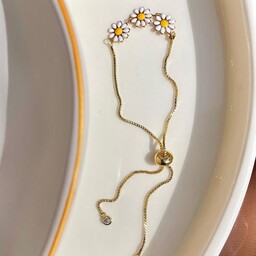 دستبند  کرواتی  گل بابونه  طلایی استیل فری سایز 
