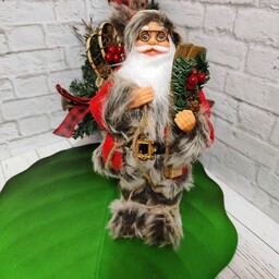 عروسک بابانوئل کاج بدست