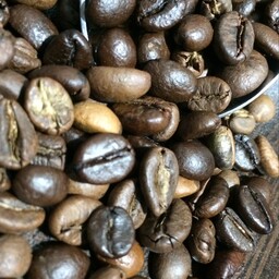 پک 1 کیلویی دانه قهوه فول کافئین 100 درصد ربوستا   روست دارک کرما متوسط طعم بسیار طلخ و کافئین فوق العاده بالا
