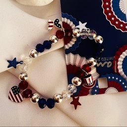 دستبند مهره کریستالی طرح پرچم امریکا همراه با اویز 