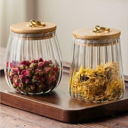 بانکه شیشه ای  در چوبی ،موجود در دو مدل بانکه تپل و هرمی،مناسب انواع چای،قند،شکر،سبزیجات خشک،قطر دهانه 8  ارتفاع 12سانت