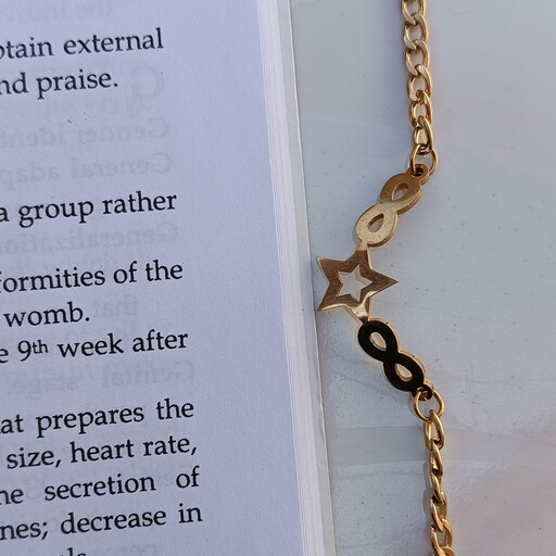 دستبند طلایی رنگ ثابت کارتیر  طرح ستاره (کد10)