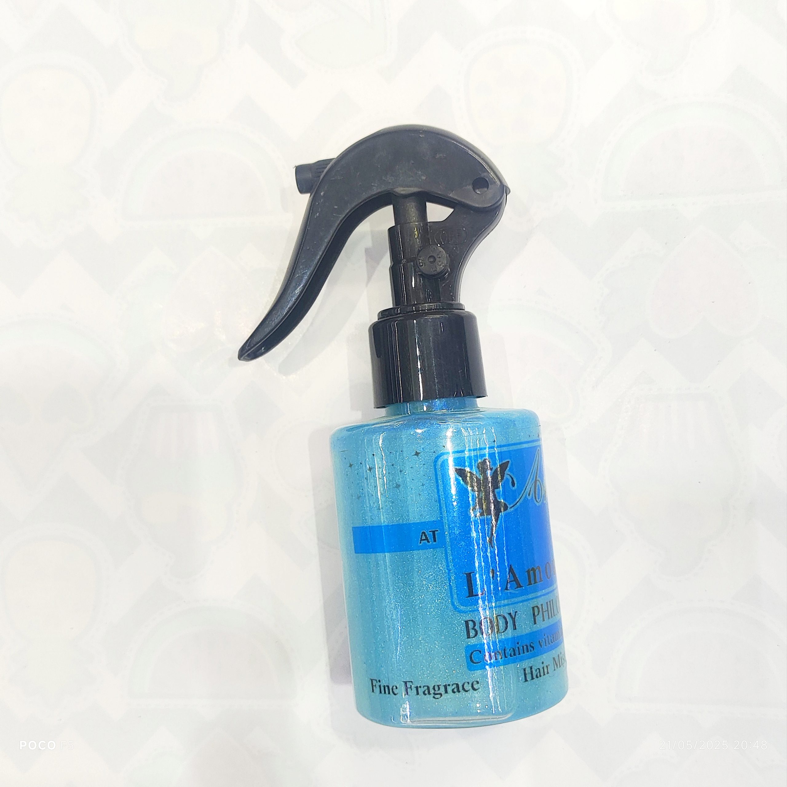 عطر مو کاریته رایحه لامور آبی