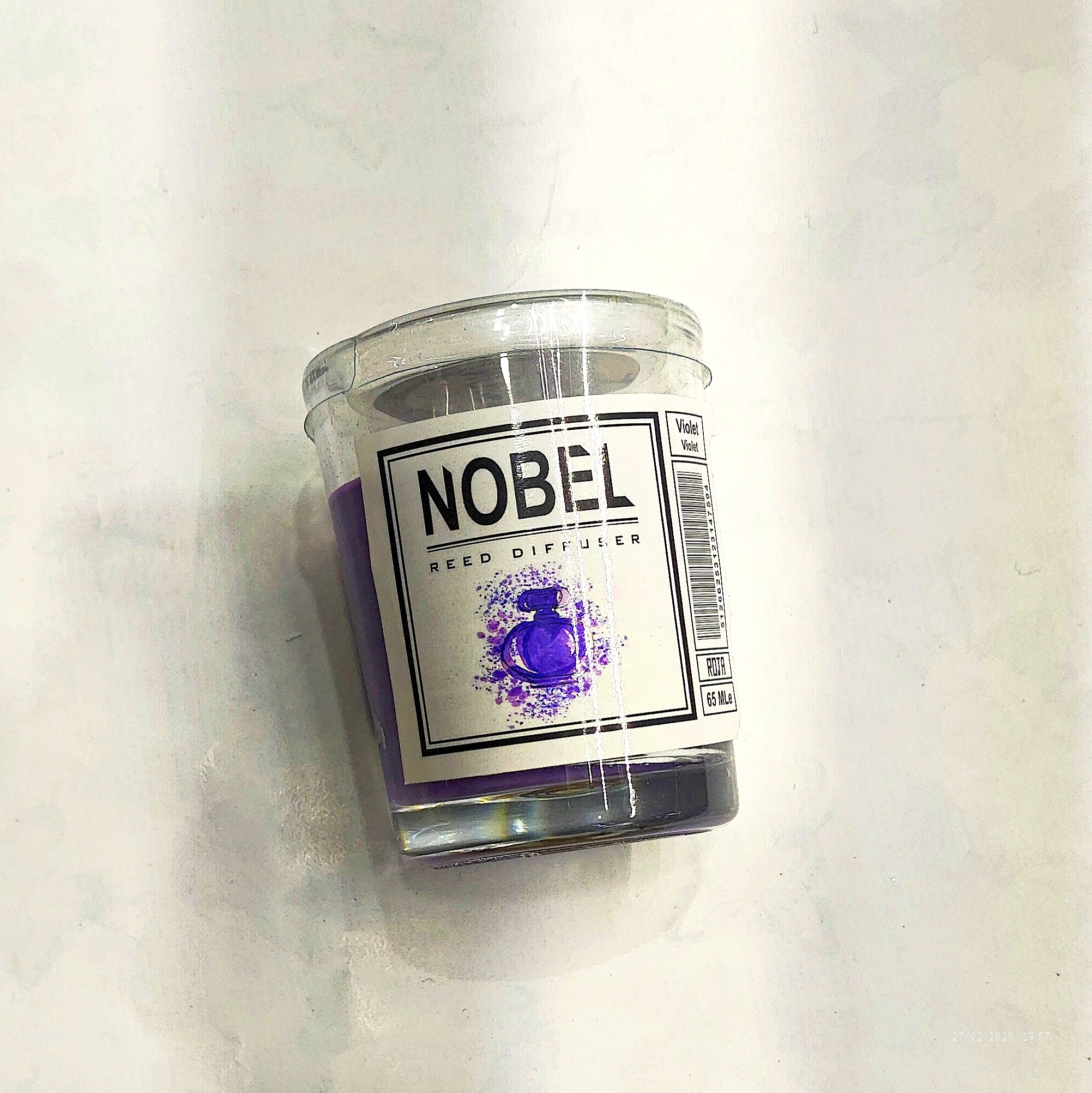 شمع عطری رایحه ادکلنی بنفش