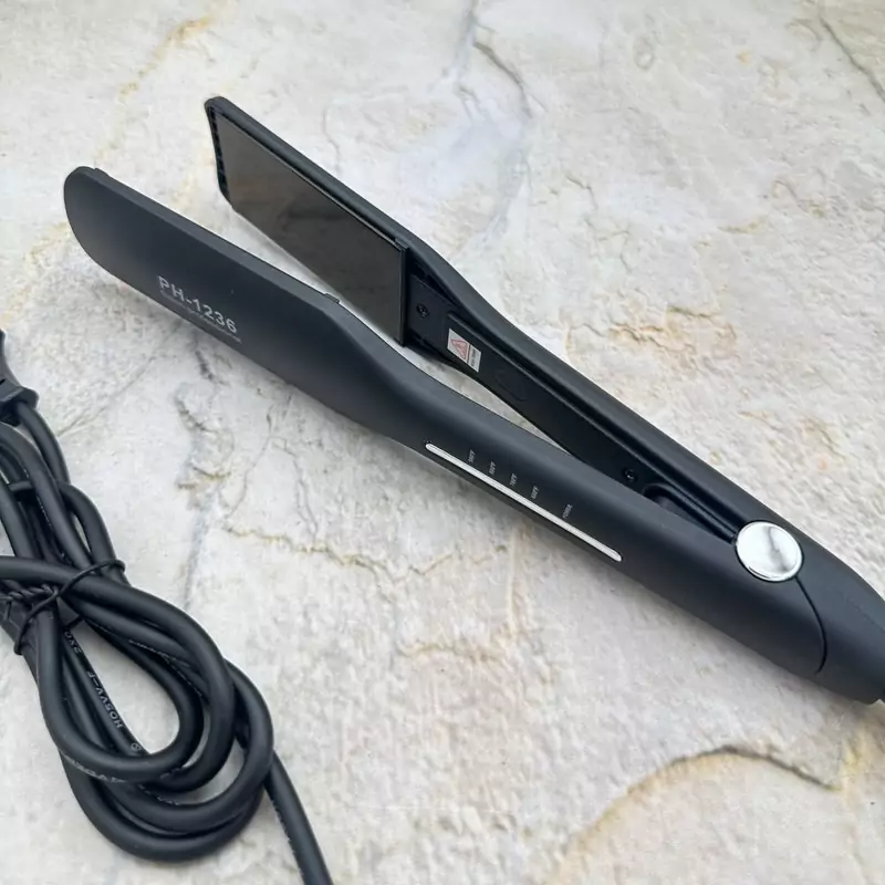 اتومو فلیپس .رنگ مشکی طلایی ،وزن 600 گرم ،کفه پهن ،کفه تیتانیوم 